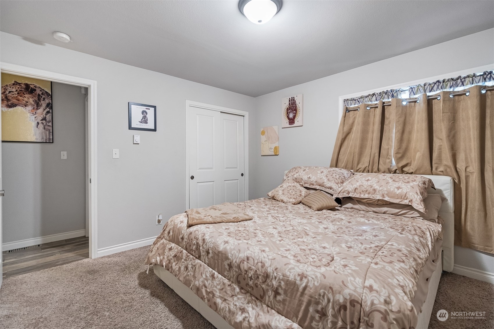 730 Tipsoo Loop South Rainier, WA 98576 - Photo 16 of 35 a bedroom with a bed and a walk in closet