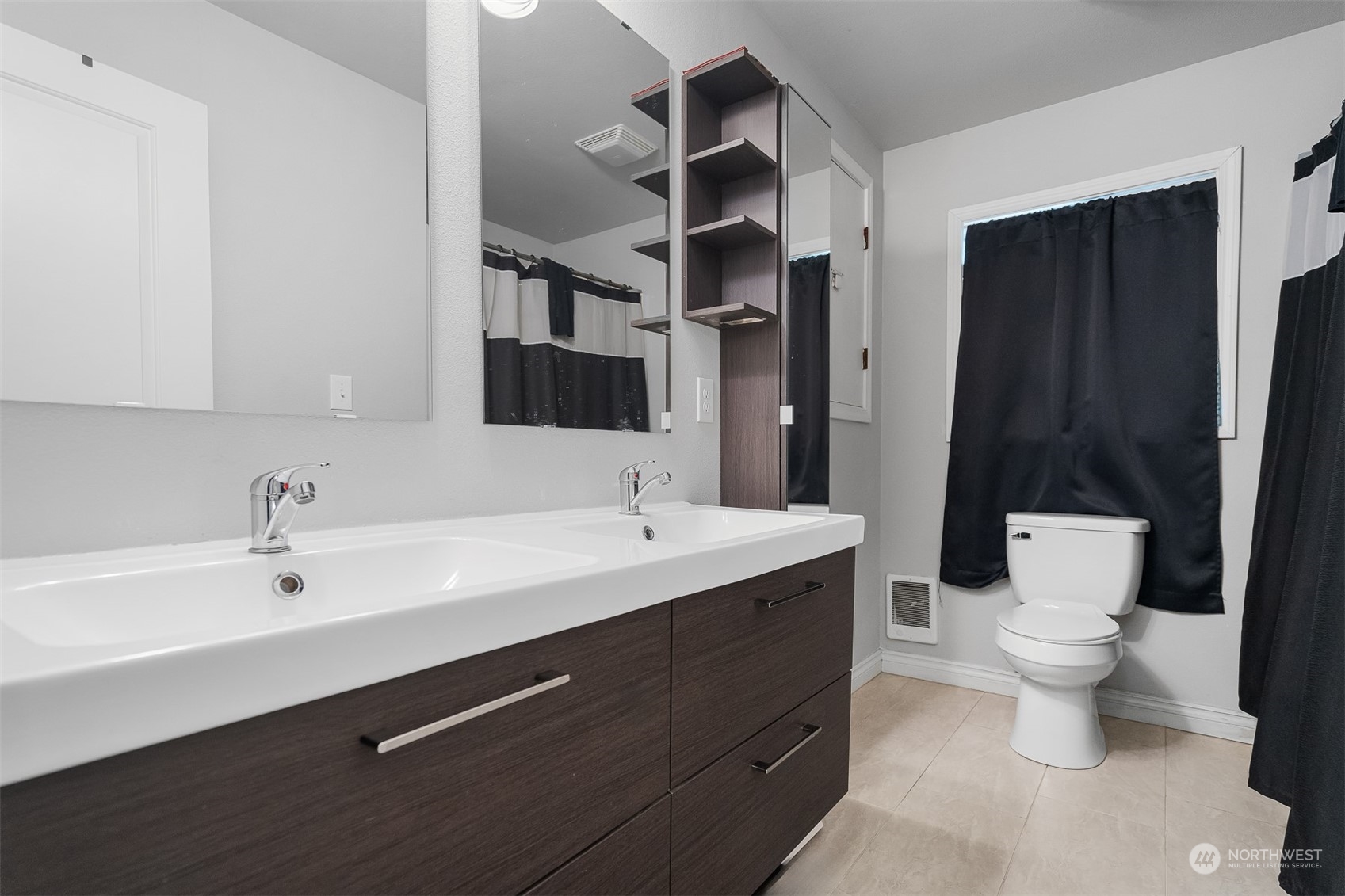 730 Tipsoo Loop South Rainier, WA 98576 - Photo 17 of 35 a bathroom with a sink and a mirror