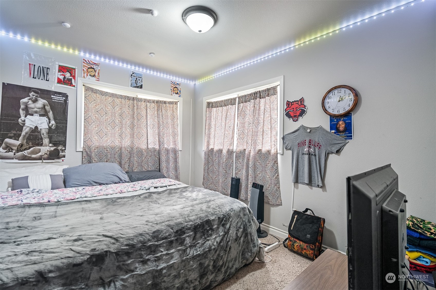 730 Tipsoo Loop South Rainier, WA 98576 - Photo 18 of 35 a bedroom with a bed and a chandelier