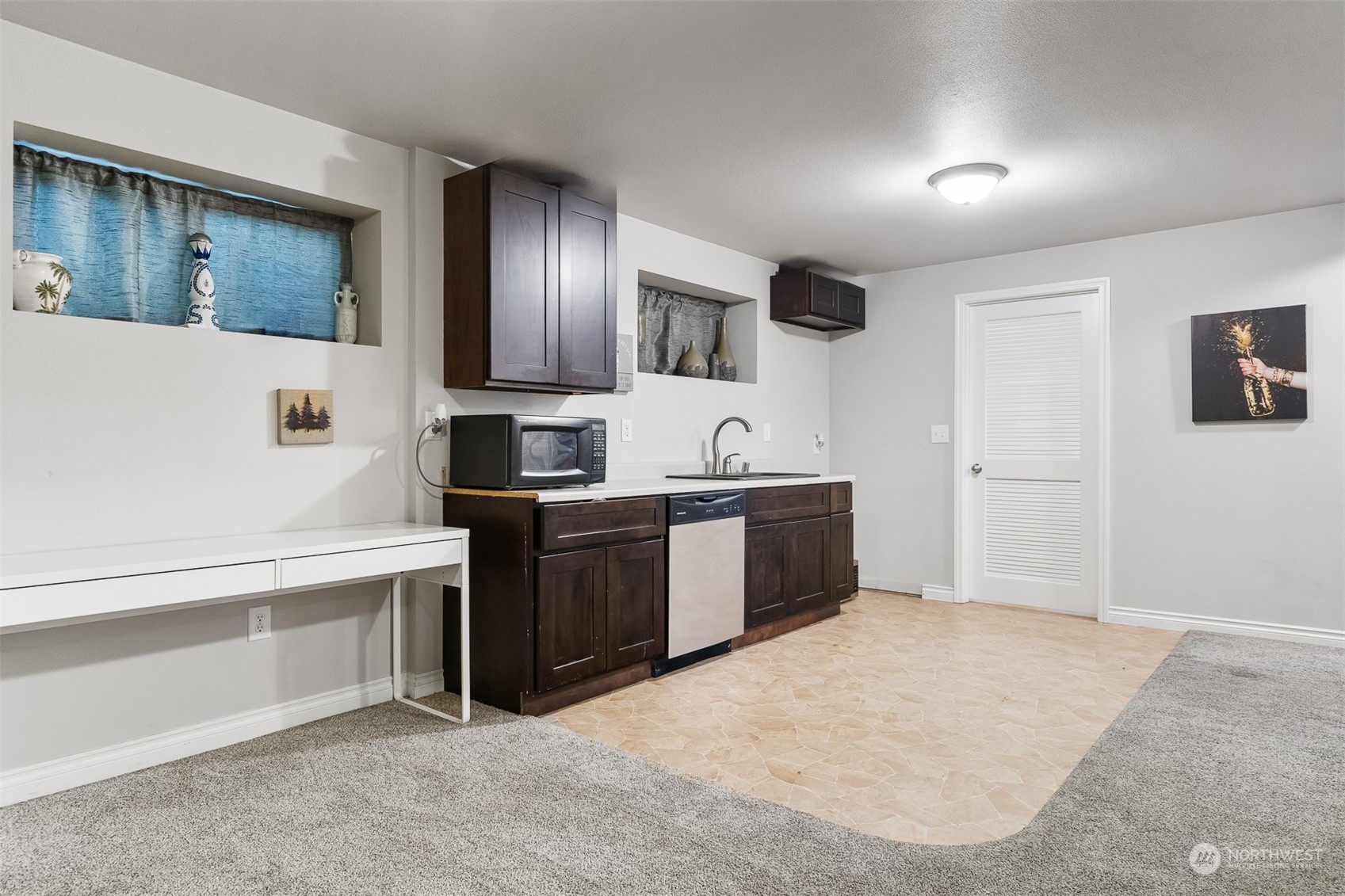 730 Tipsoo Loop South Rainier, WA 98576 - Photo 20 of 35 a large white kitchen with stainless steel appliances granite countertop a stove and a refrigerator