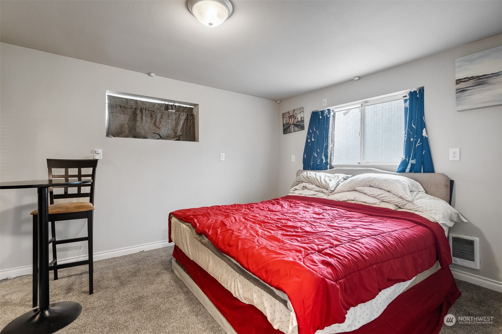 730 Tipsoo Loop South Rainier, WA 98576 - Photo 26 of 35 a bedroom with a bed and a painting on the wall