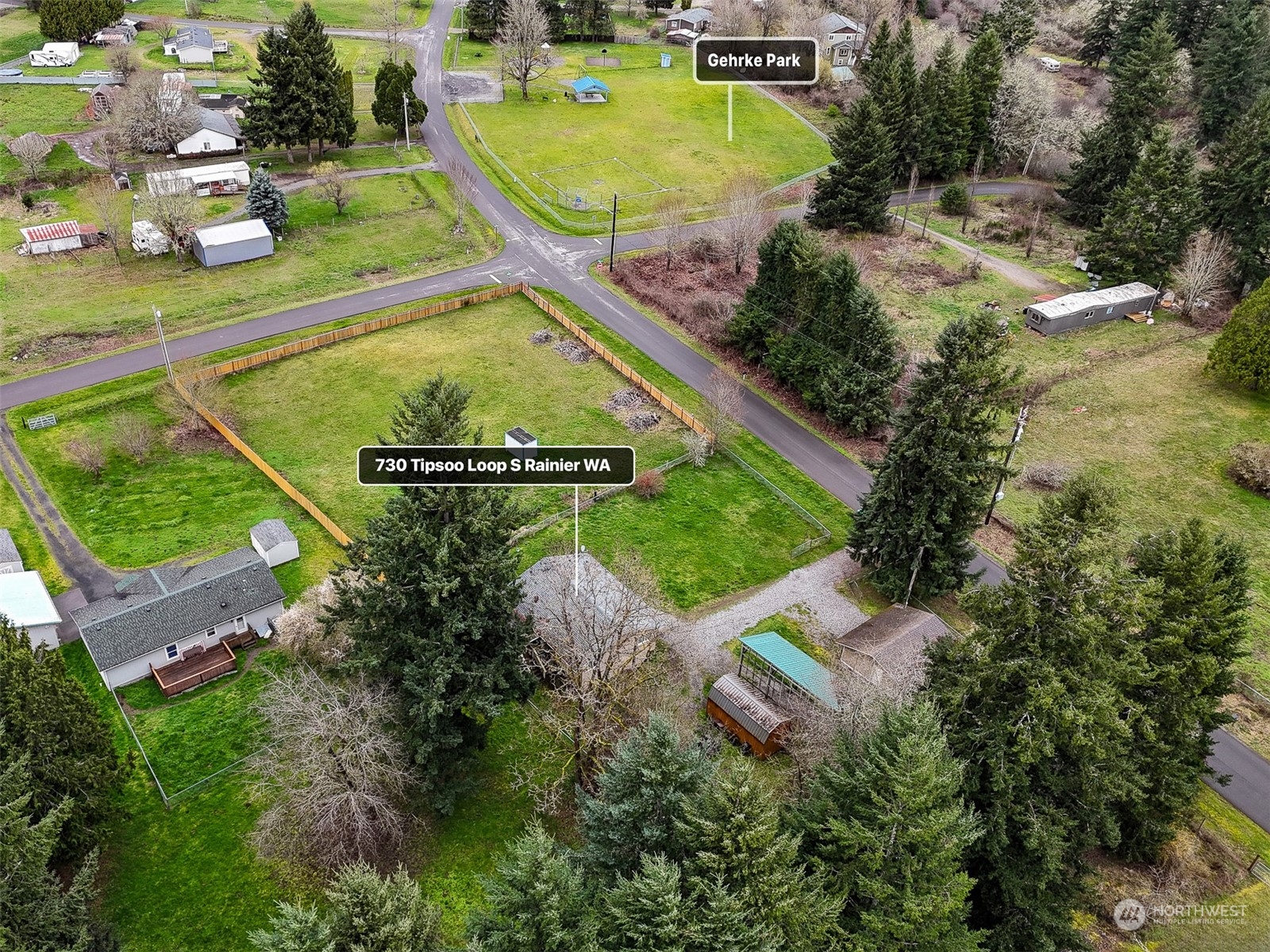 730 Tipsoo Loop South Rainier, WA 98576 - Photo 34 of 35 an aerial view of a house with a swimming pool