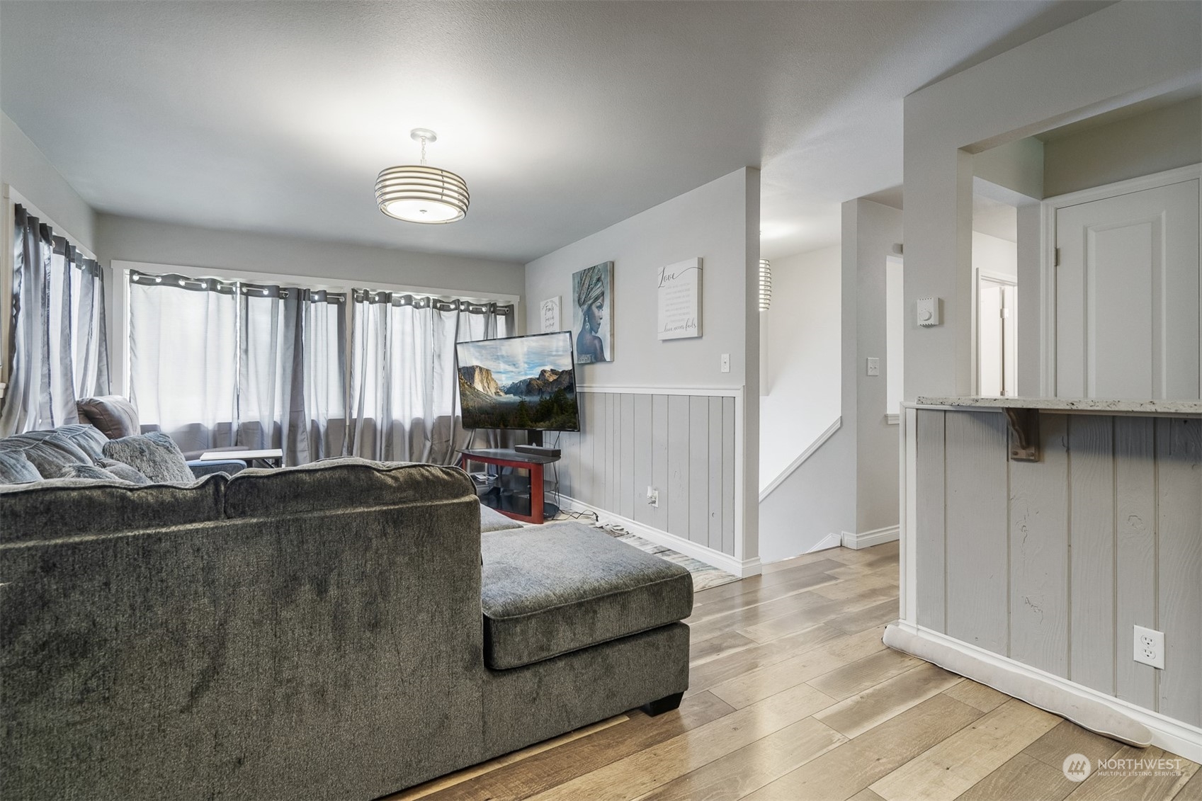 730 Tipsoo Loop South Rainier, WA 98576 - Photo 6 of 35 a living room with furniture and a flat screen tv