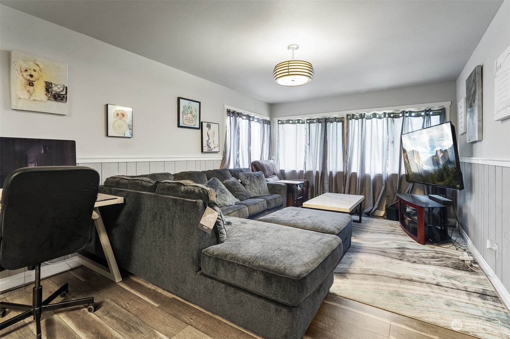 730 Tipsoo Loop South Rainier, WA 98576 - Photo 7 of 35 a living room with furniture and a flat screen tv