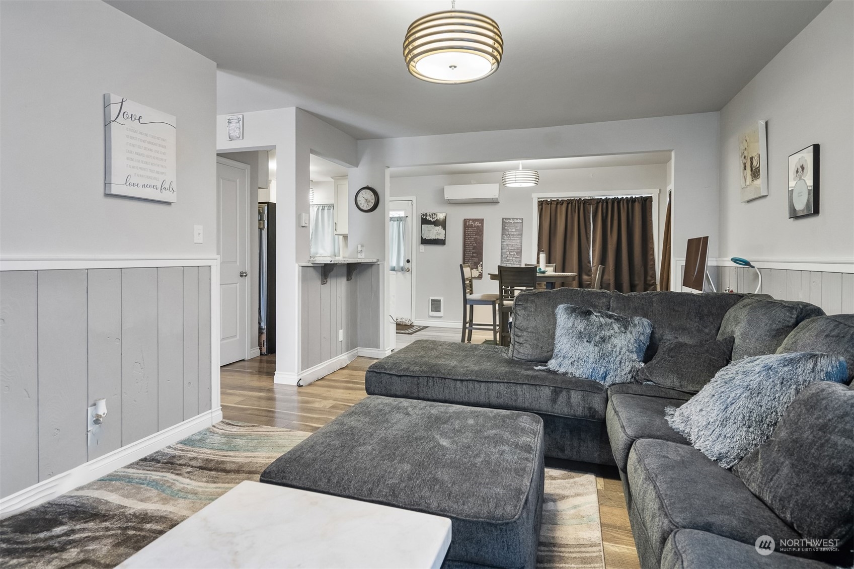 730 Tipsoo Loop South Rainier, WA 98576 - Photo 8 of 35 a living room with furniture and a rug