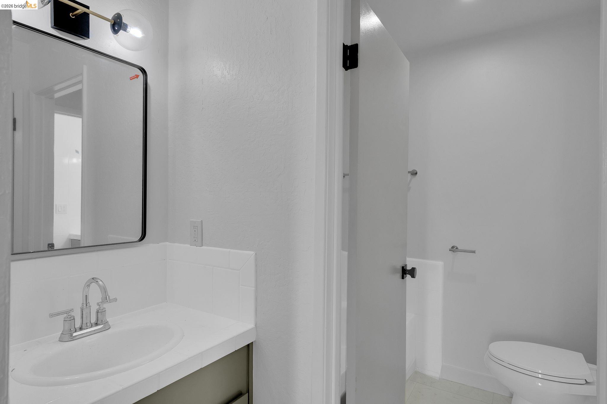 1808 Wildbrook Court, Unit D Concord, CA 94521 - Photo 39 of 47 a bathroom with a sink a toilet and shower