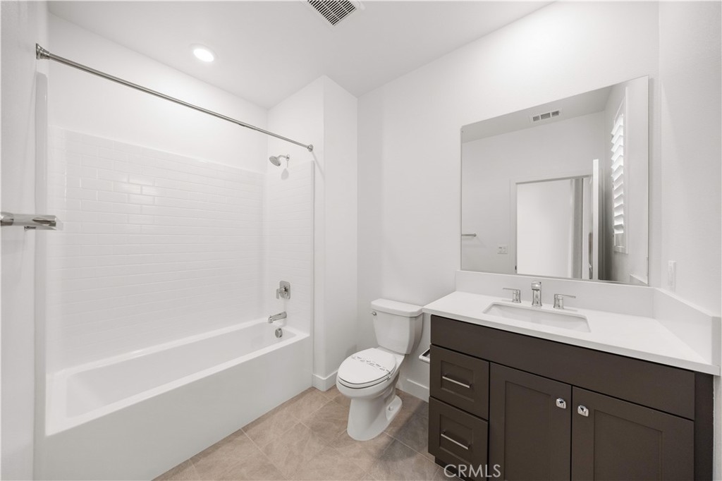 312 Tank Irvine, CA 92618 - Photo 34 of 75 a bathroom with a sink a toilet and shower
