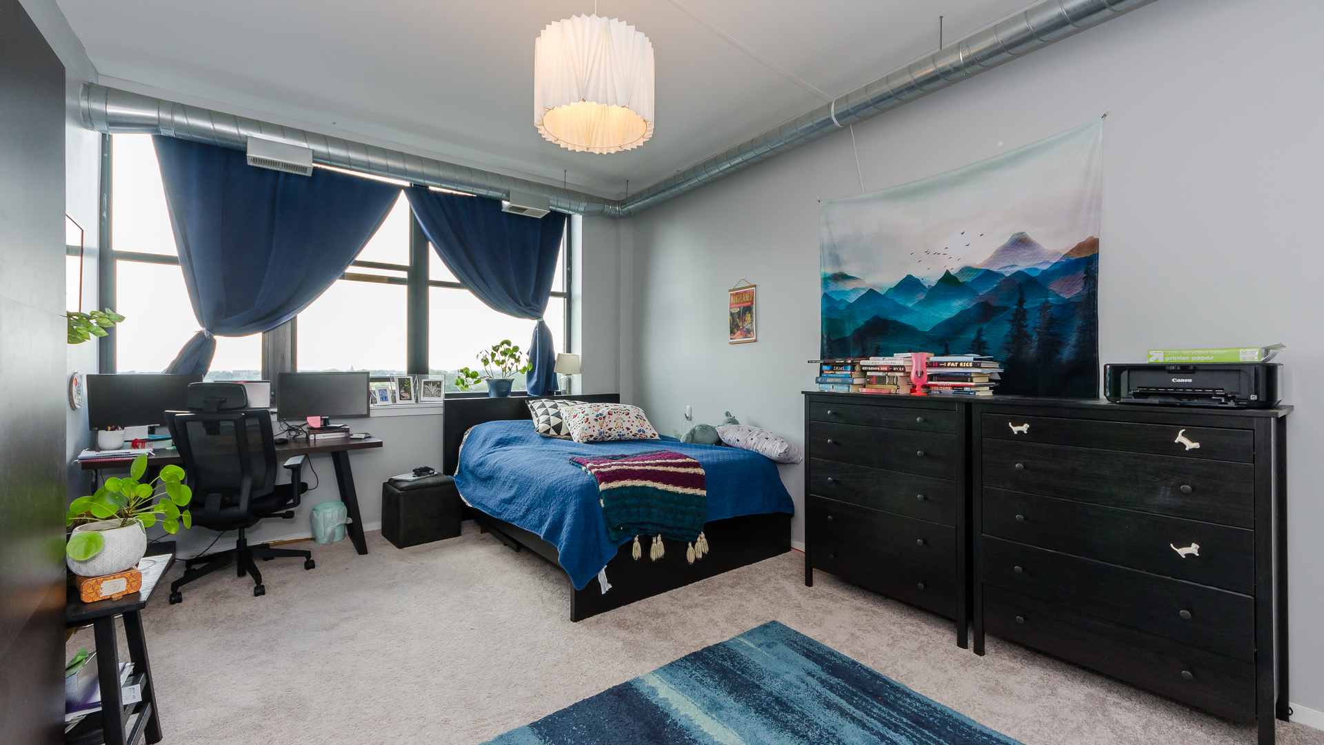 2323 West Pershing Road, Unit 602 Chicago, IL 60609 - Photo 13 of 29 a bedroom with a bed closet and a large window