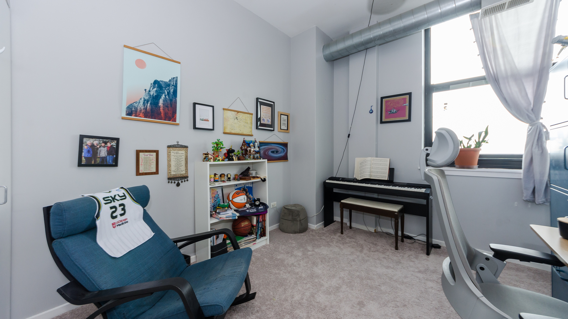 2323 West Pershing Road, Unit 602 Chicago, IL 60609 - Photo 16 of 29 a living room with furniture and a window