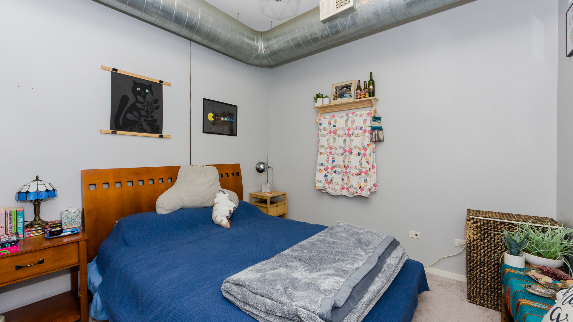 2323 West Pershing Road, Unit 602 Chicago, IL 60609 - Photo 18 of 29 a bedroom with furniture and wooden floor