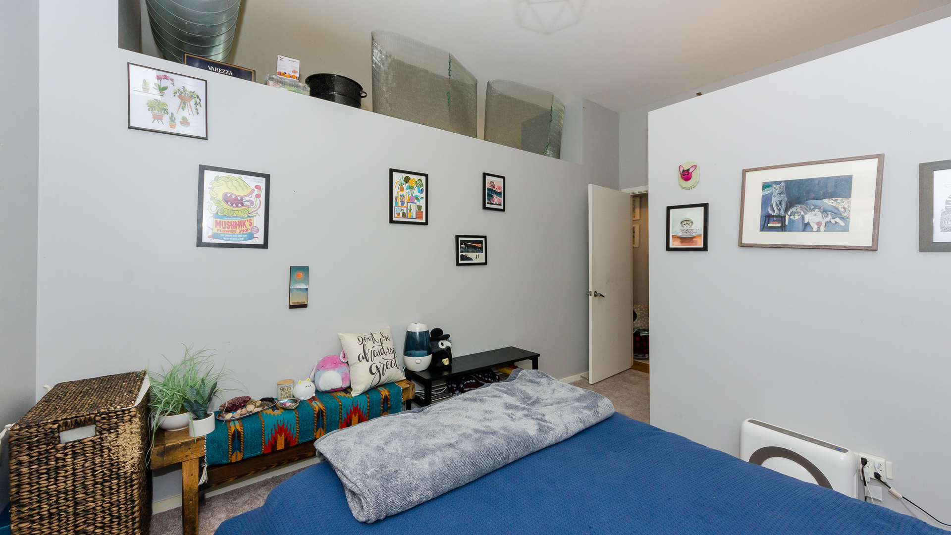 2323 West Pershing Road, Unit 602 Chicago, IL 60609 - Photo 19 of 29 a bed room with furniture and wooden floor