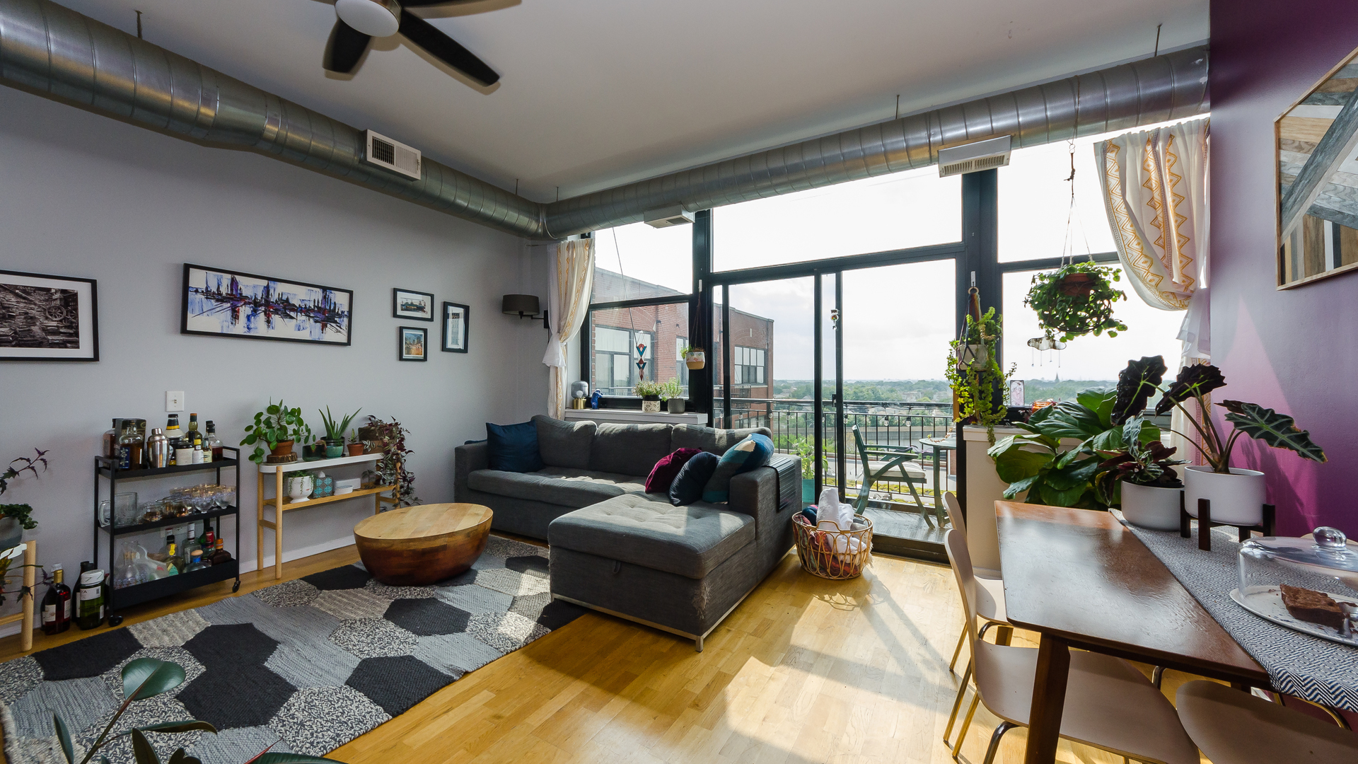 2323 West Pershing Road, Unit 602 Chicago, IL 60609 - Photo 5 of 29 a living room with furniture and a large window