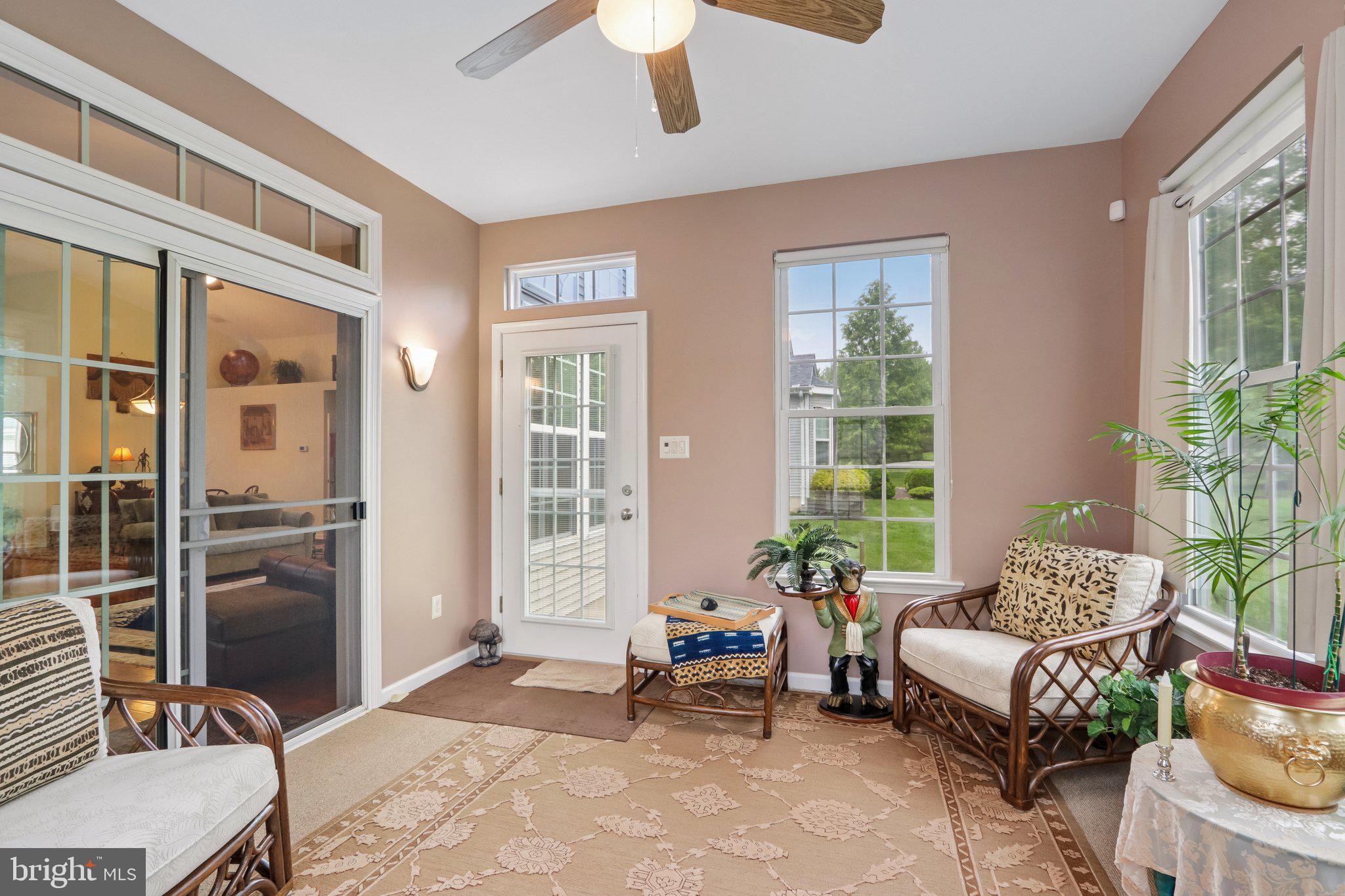 39 Danbury Road Swedesboro, NJ 08085 - Photo 11 of 62 a living room with furniture and a large window