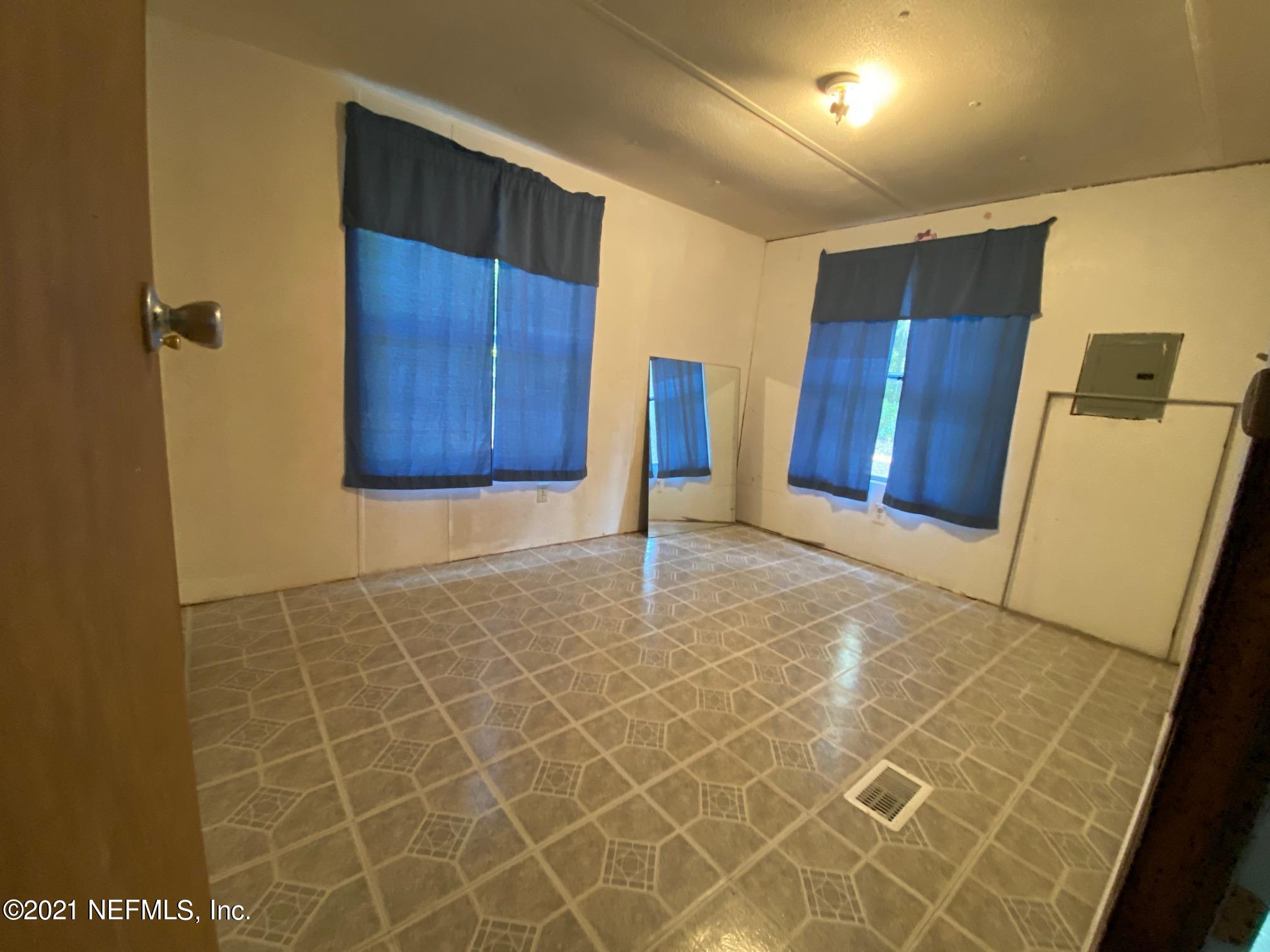 196 Indian Lakes Road Hawthorne, FL 32640 - Photo 13 of 27 a view of a storage & utility room