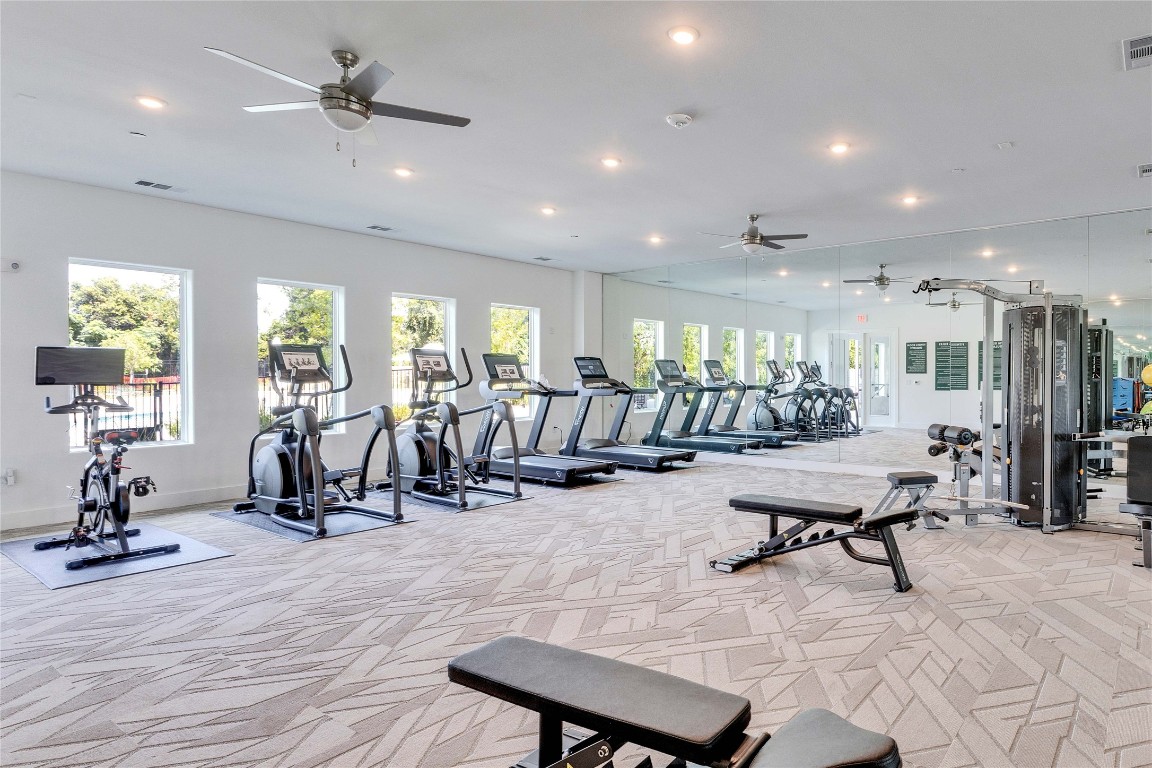 4802 South Congress Avenue, Unit 507 Austin, TX 78745 - Photo 28 of 30 Gym with ceiling fan and recessed lighting