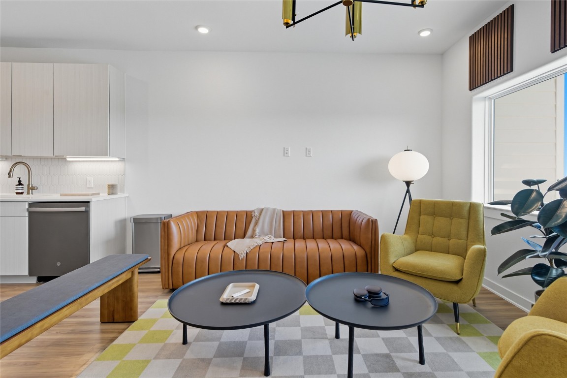 4802 South Congress Avenue, Unit 507 Austin, TX 78745 - Photo 10 of 30 Living room with light wood-style floors and recessed lighting