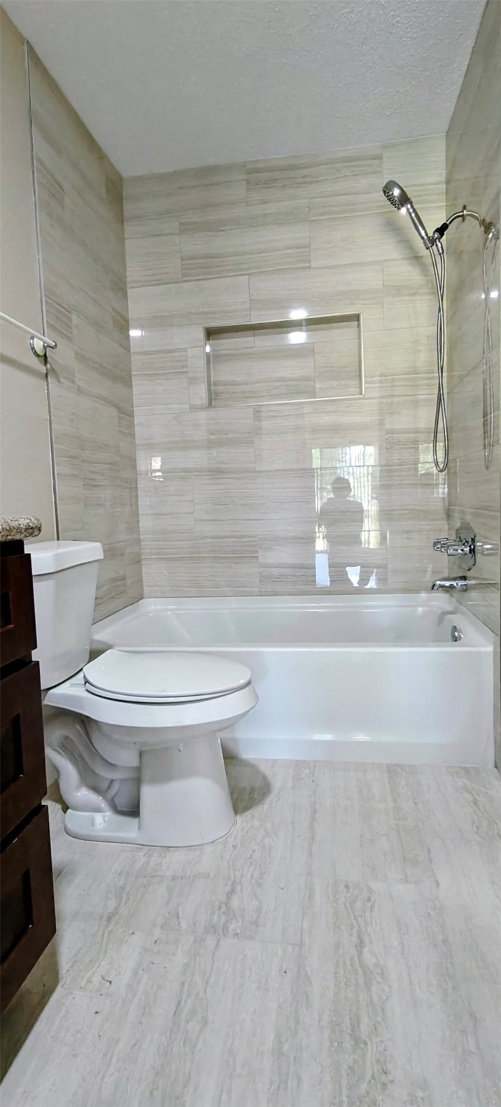 8413 Sands Point Drive Houston, TX 77036 - Photo 18 of 23 a bathroom with a toilet and a shower