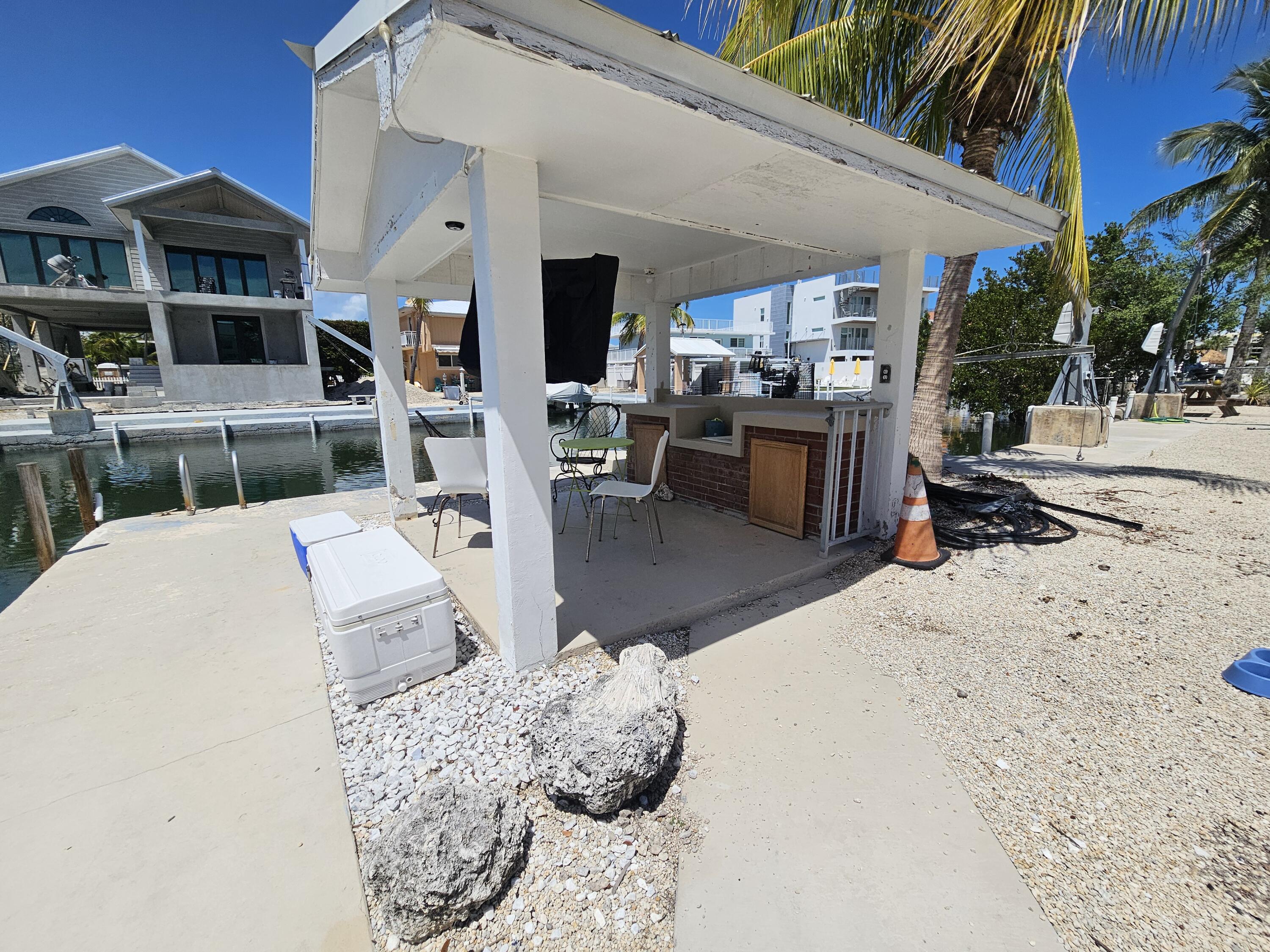 174 Corrine Place Key Largo, FL 33037 - Photo 19 of 28 a view of a living room and kitchen