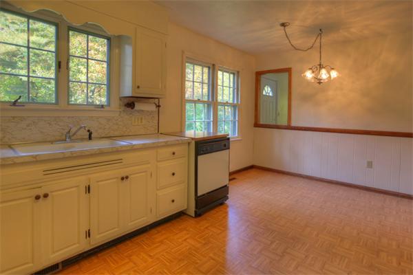 103 Hartland Road Tolland, MA 01034 - Photo 6 of 12 a kitchen with sink and cabinets