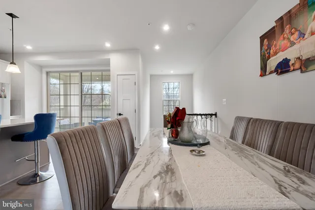 a bed room with furniture and a window