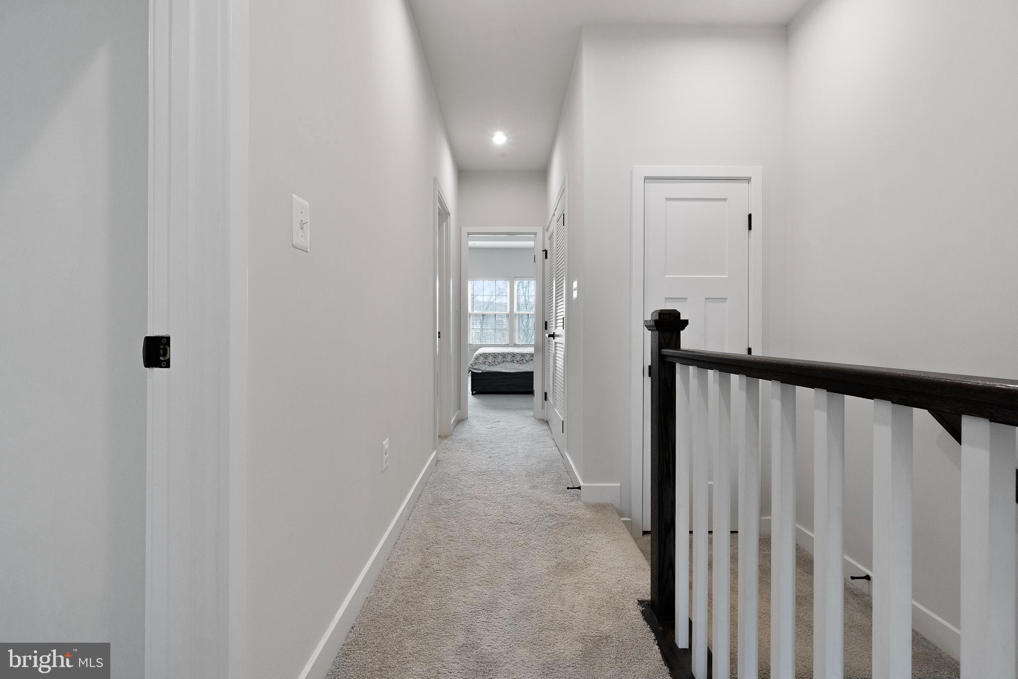 7922 Brandy Station Road Hanover, MD 21076 - Photo 9 of 22 a view of a hallway with wooden floor and entryway