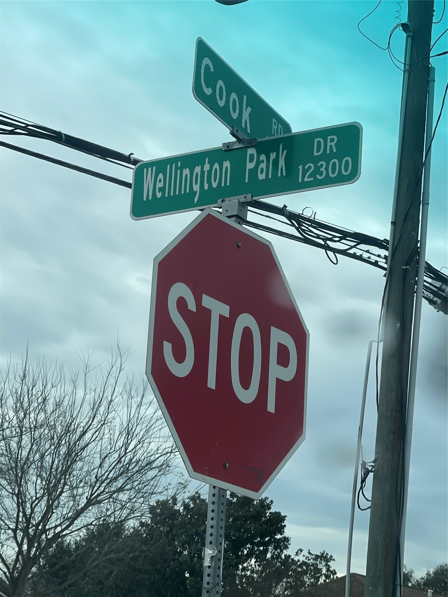 0 Cook Road Houston, TX 77072 - Photo 3 of 17 a blue sign broad on a wall