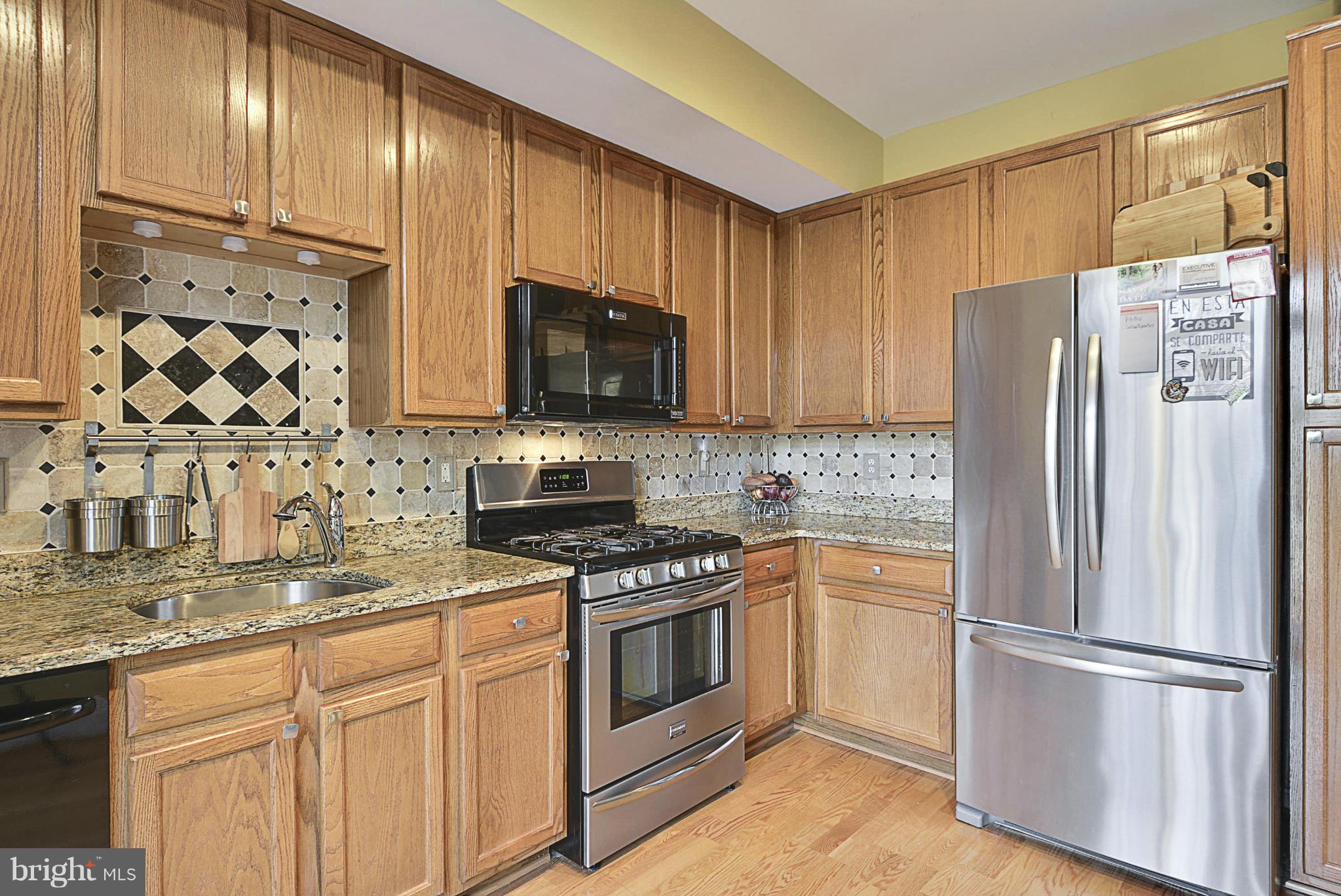 1305 Windleaf Drive, Unit 168 Reston, VA 20194 - Photo 6 of 29 Kitchen