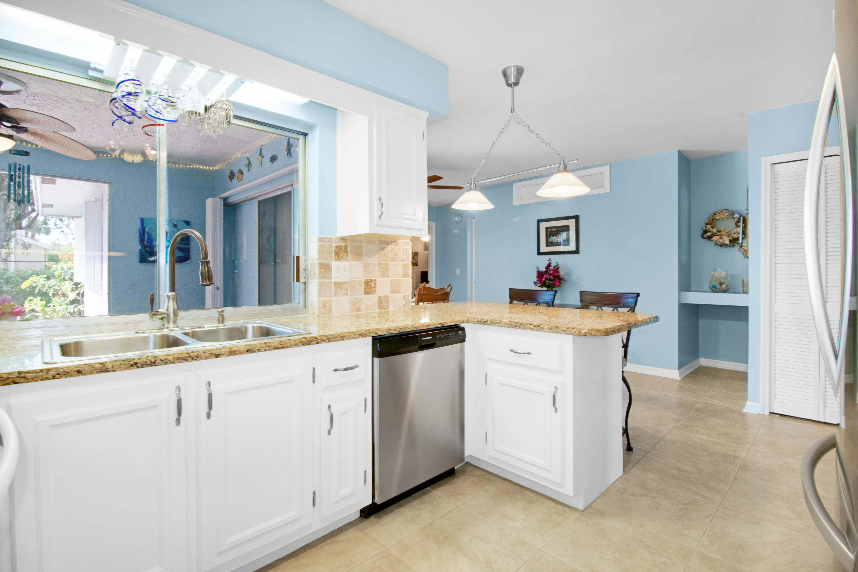 22576 Lanyard Street Boca Raton, FL 33428 - Photo 25 of 47 Kitchen. White closet on right is pantry