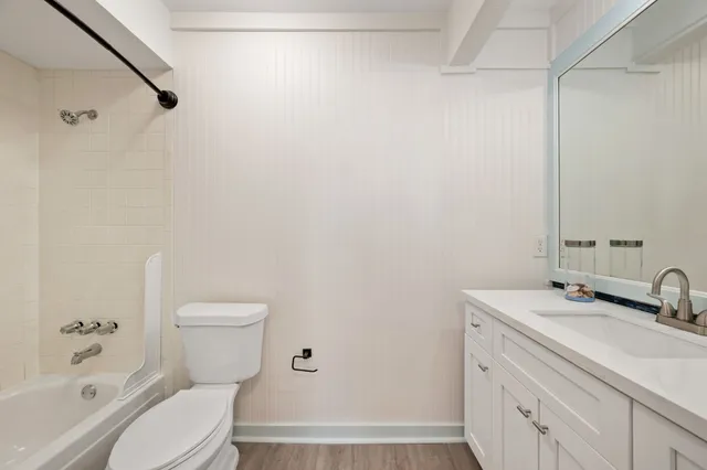 a bed room with a bed and a couch