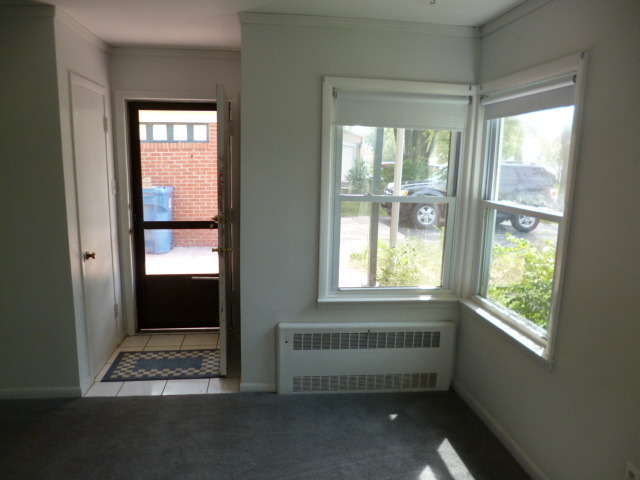 809 St Andrews Drive Crete, IL 60417 - Photo 16 of 24 an empty room with a window