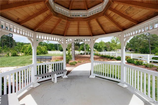 a view of a porch with a garden