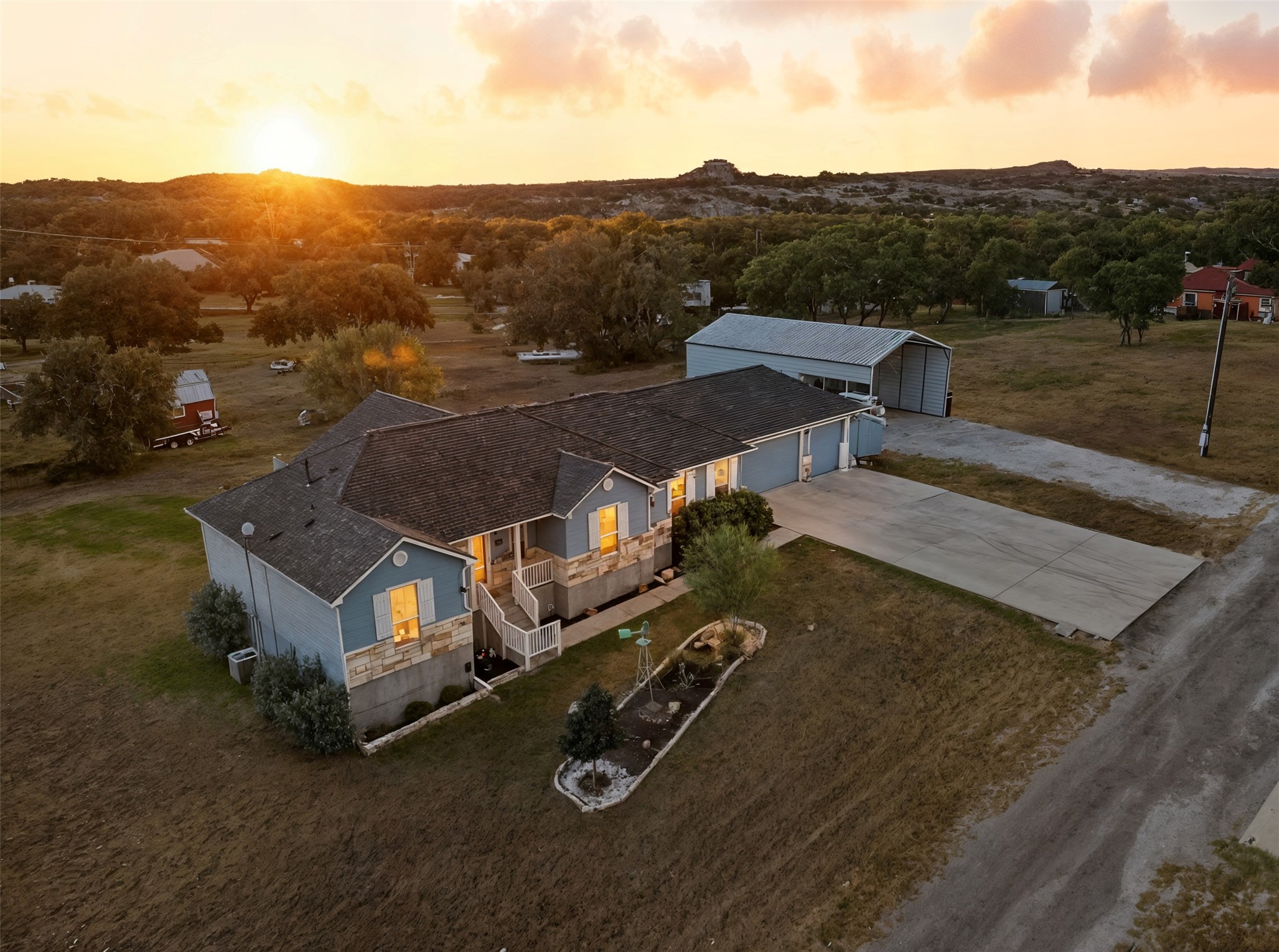 113 Rio Vista Road Burnet, TX 78611 - Photo 2 of 28 Aerial view at dusk