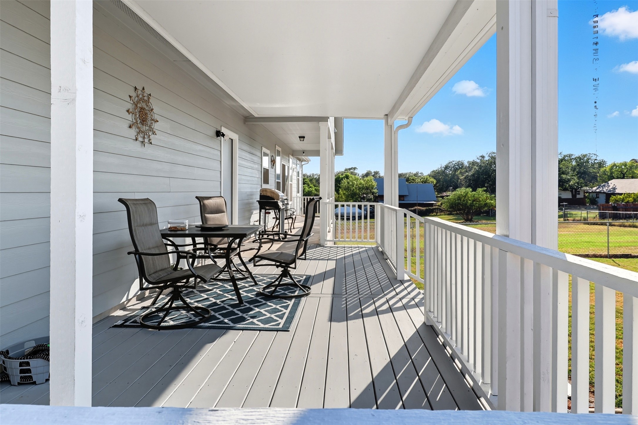 113 Rio Vista Road Burnet, TX 78611 - Photo 23 of 28 Wooden terrace with outdoor dining area