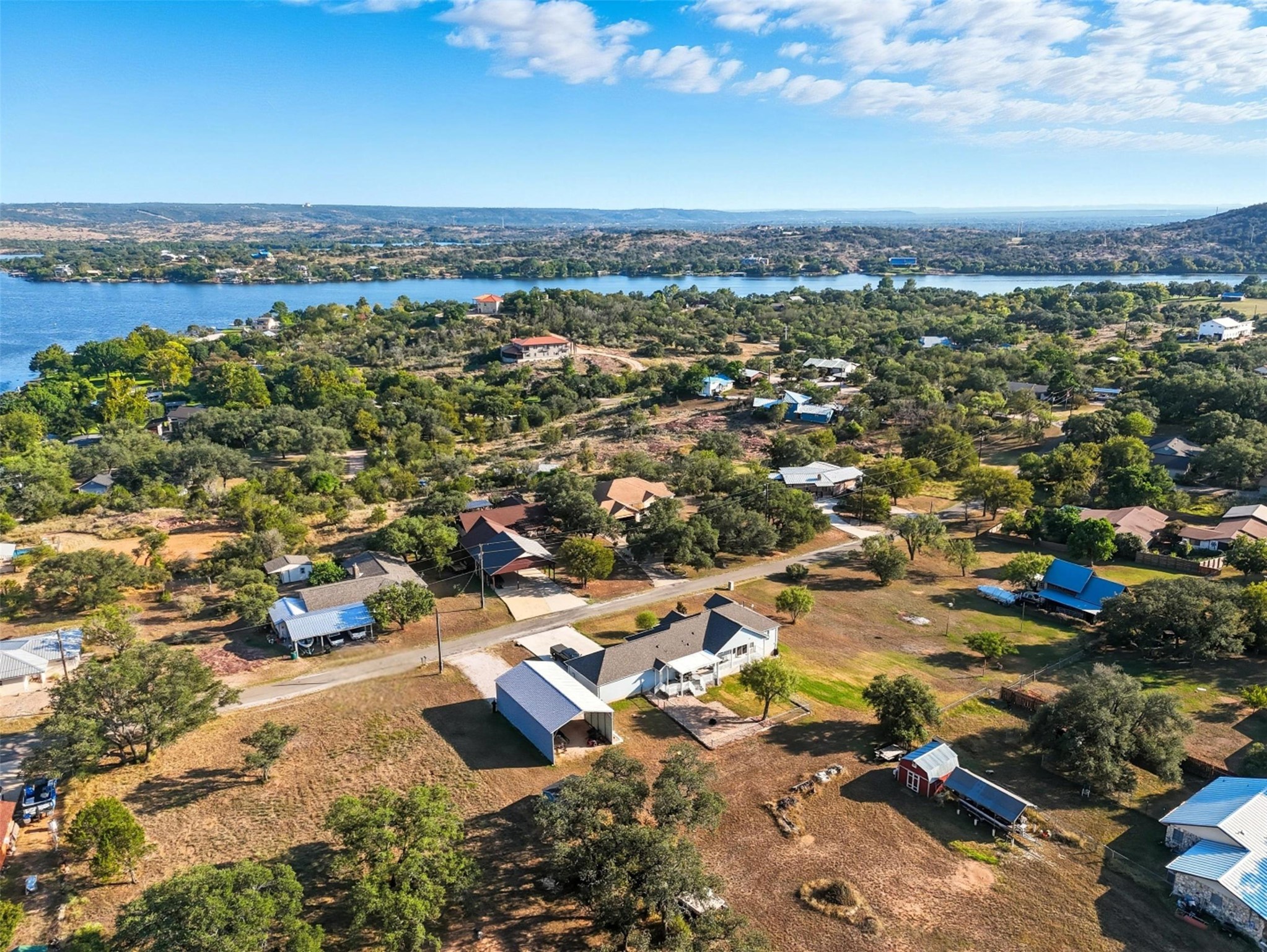 113 Rio Vista Road Burnet, TX 78611 - Photo 26 of 28 Aerial view of residential area featuring a nearby body of water