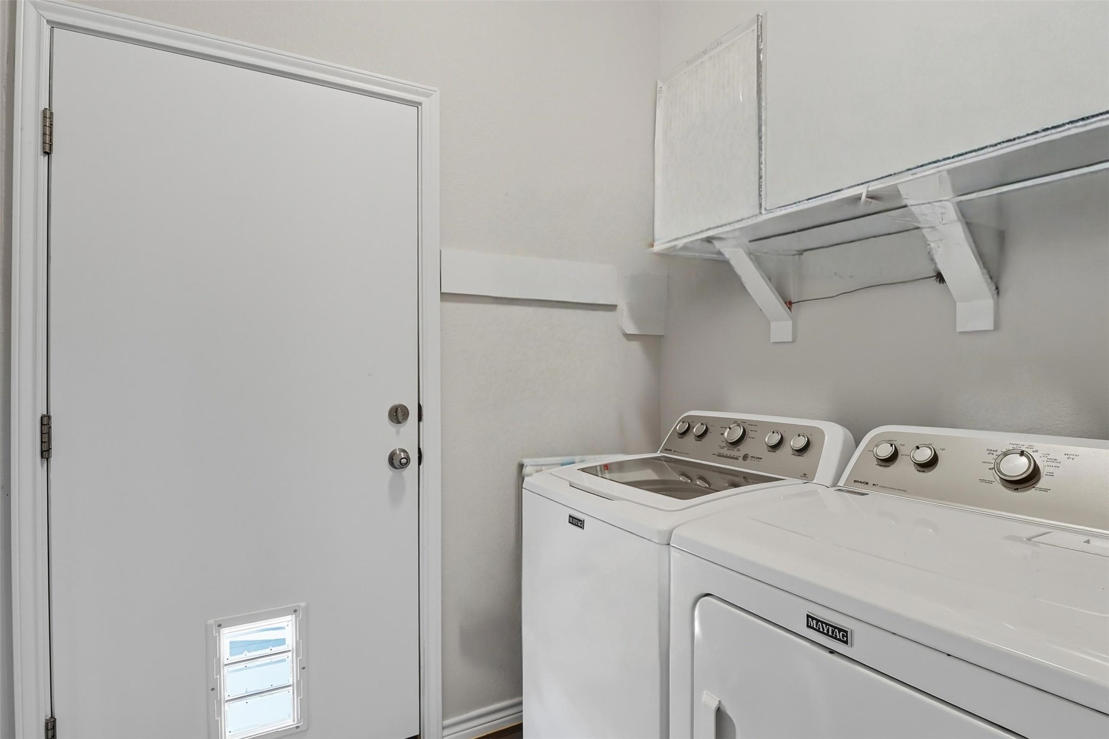 113 Rio Vista Road Burnet, TX 78611 - Photo 27 of 28 Washroom with washer and dryer