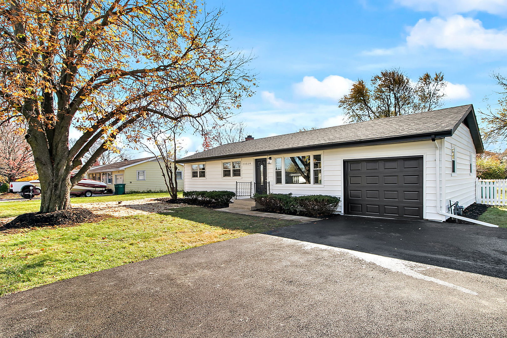 23519 West Renwick Road Plainfield, IL 60586 - Photo 1 of 22 a view of a house with a yard and garage