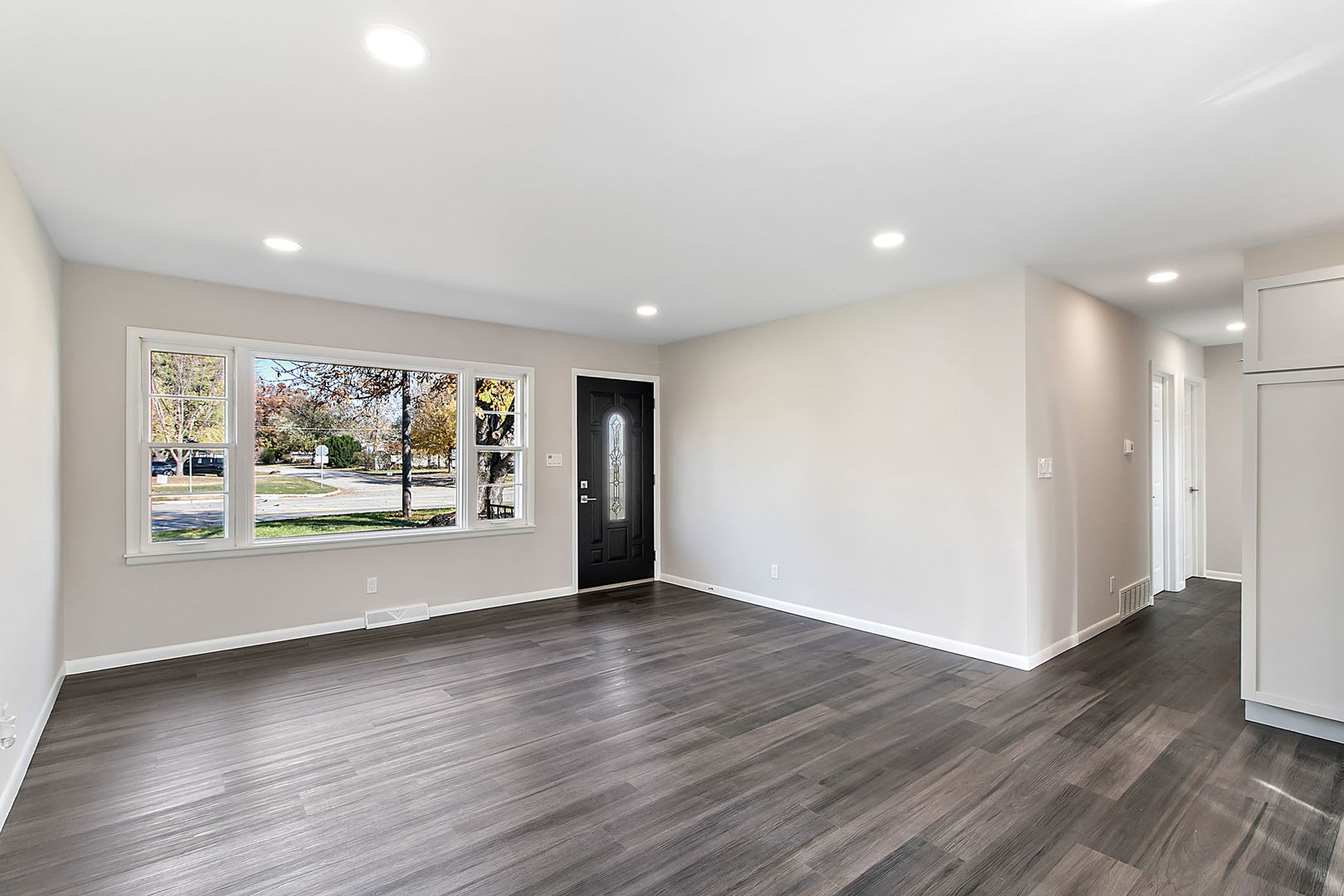 23519 West Renwick Road Plainfield, IL 60586 - Photo 13 of 22 wooden floor in an empty room with a window