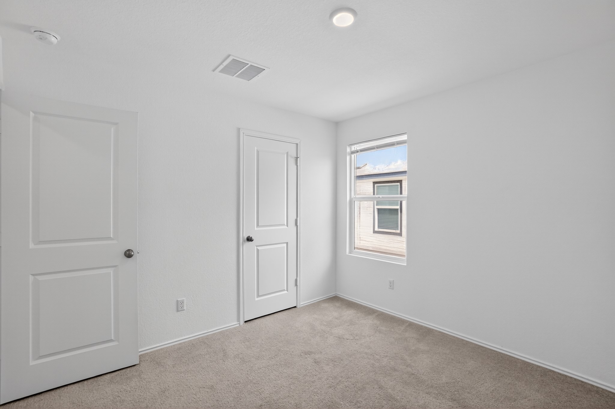 604 Marty Allen Loop Jarrell, TX 76537 - Photo 11 of 15 A spacious, naturally illuminated room, perfect for creating a cozy private retreat.