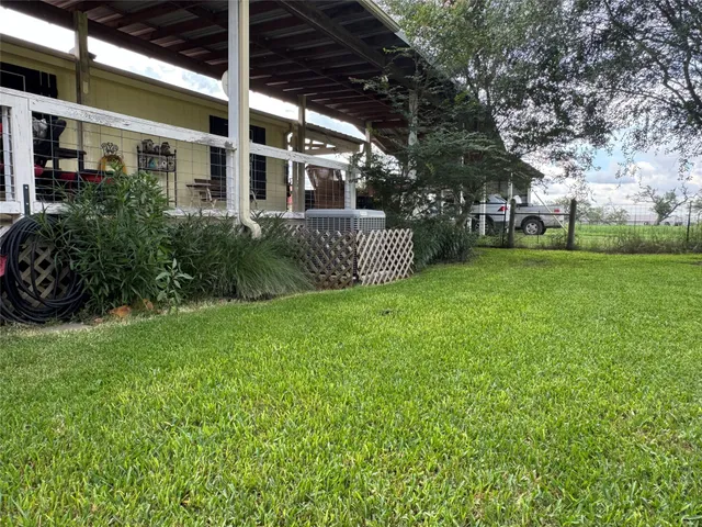 a view of a house with a garden