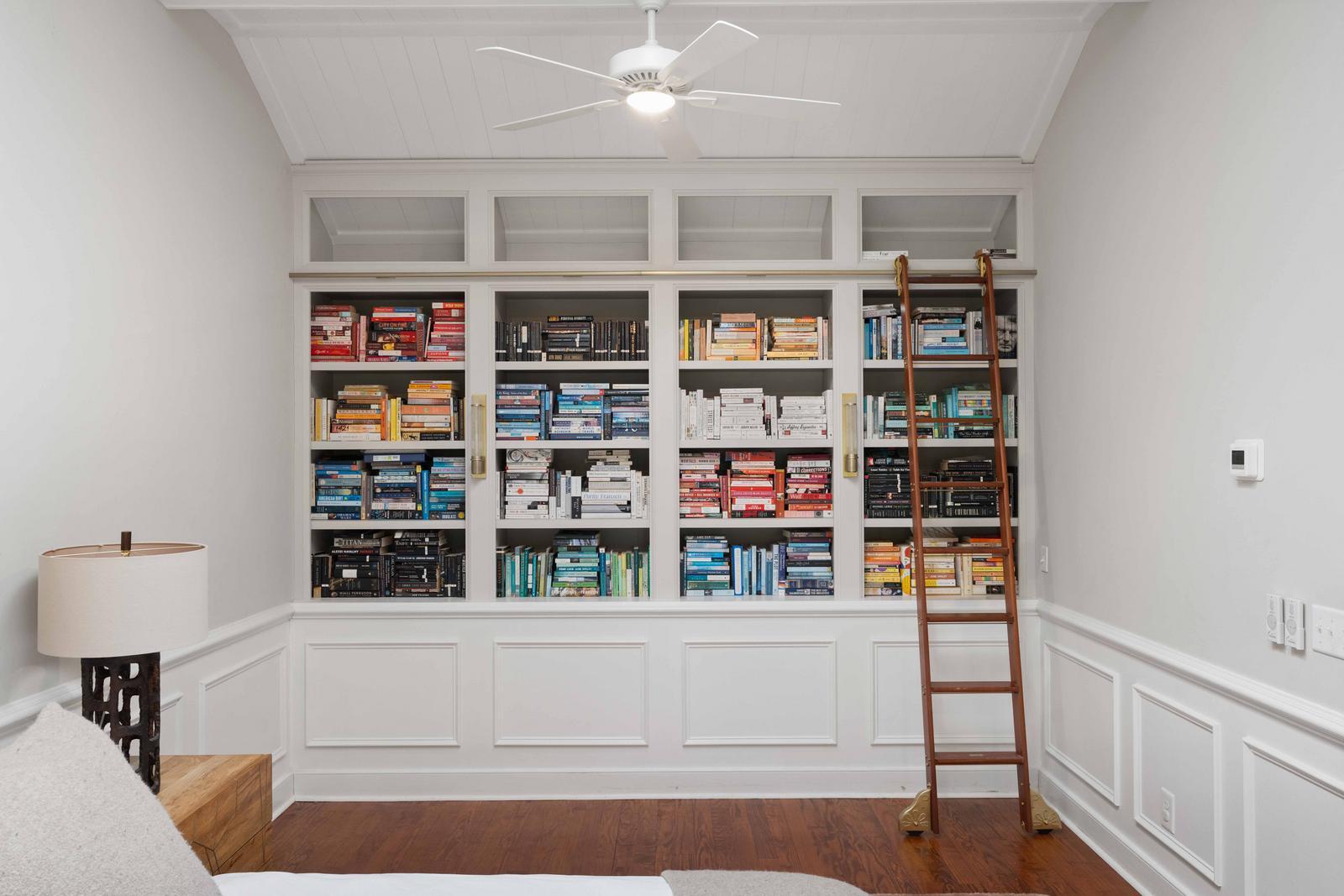 100 Queen Street Charleston, SC 29401 - Photo 22 of 58 Primary Bedroom Custom Bookshelves