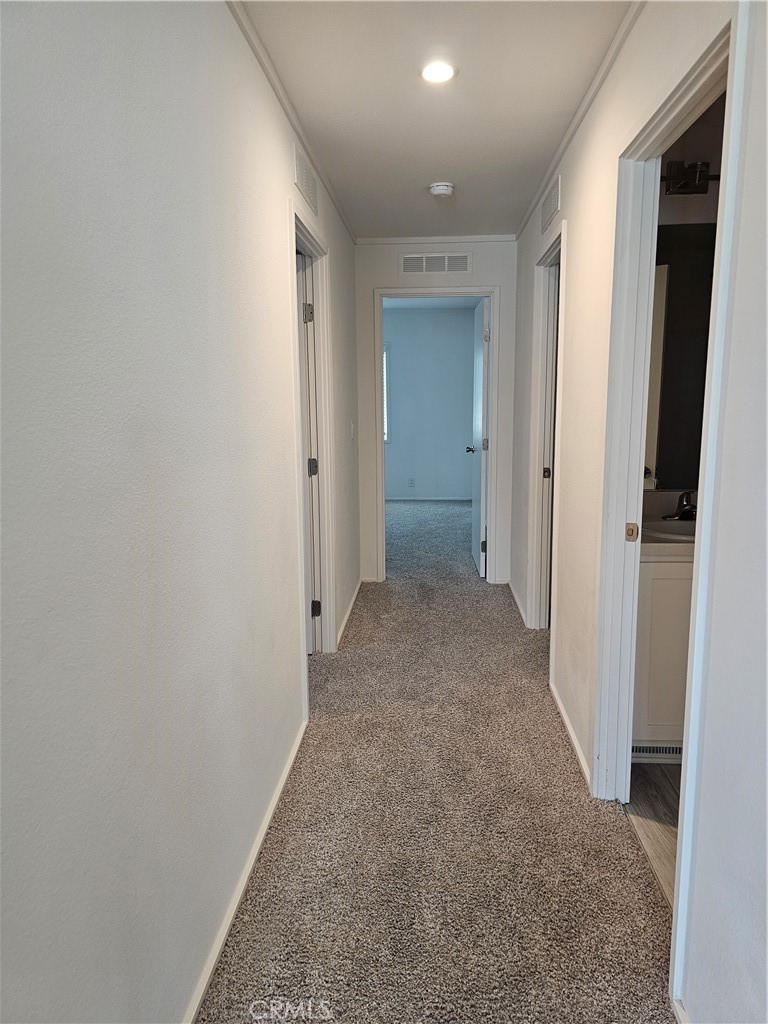 1560 Massachussetts Avenue, Unit 94 Riverside, CA 92570 - Photo 15 of 15 a view of hallway