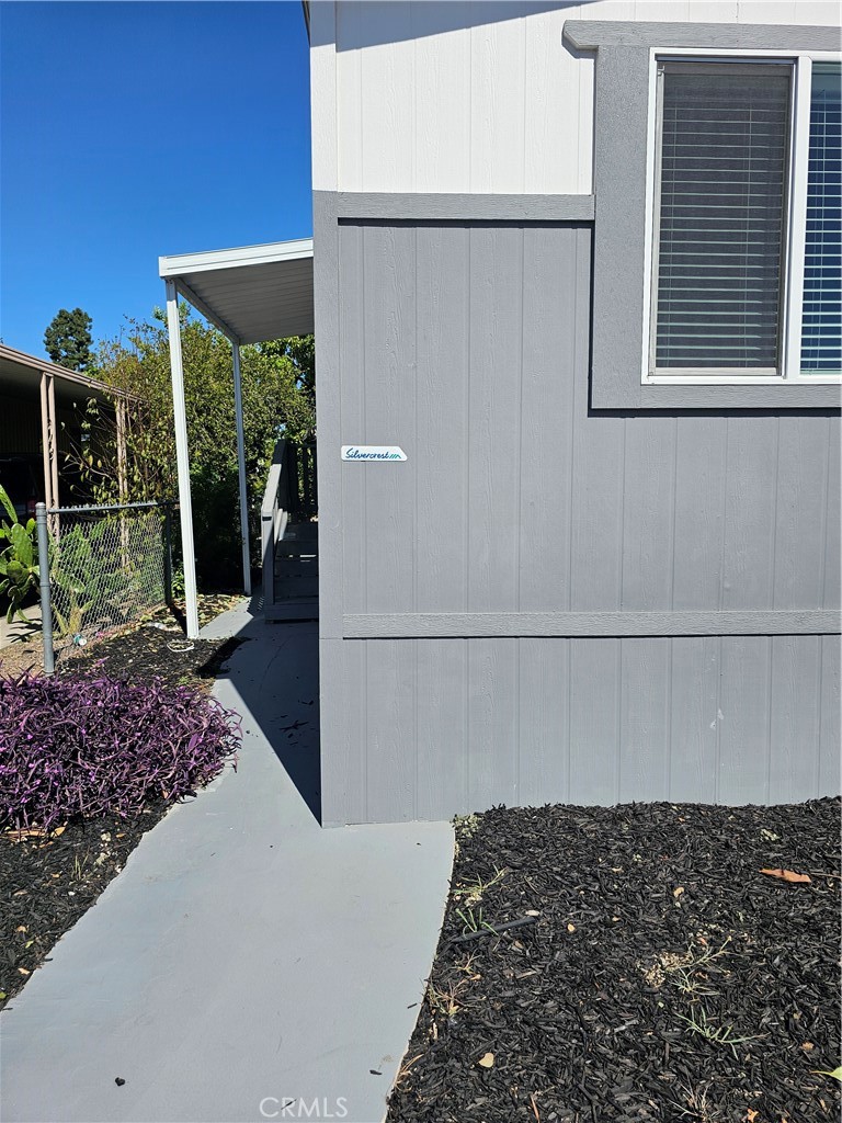 1560 Massachussetts Avenue, Unit 94 Riverside, CA 92570 - Photo 5 of 15 a view of a pathway of a house