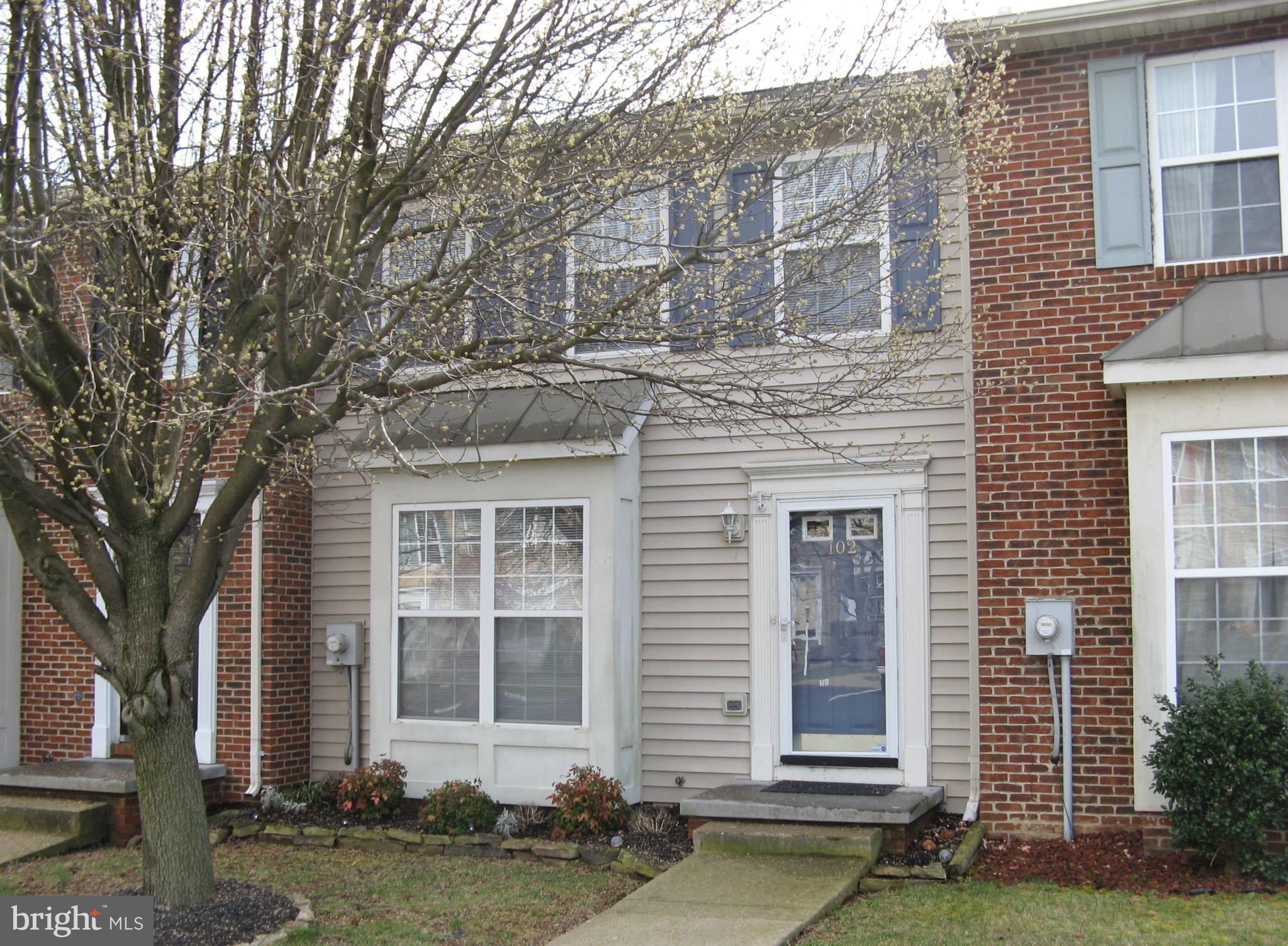 102 Chatham Square Winchester, VA 22601 - Photo 1 of 29 a front view of a house with a yard