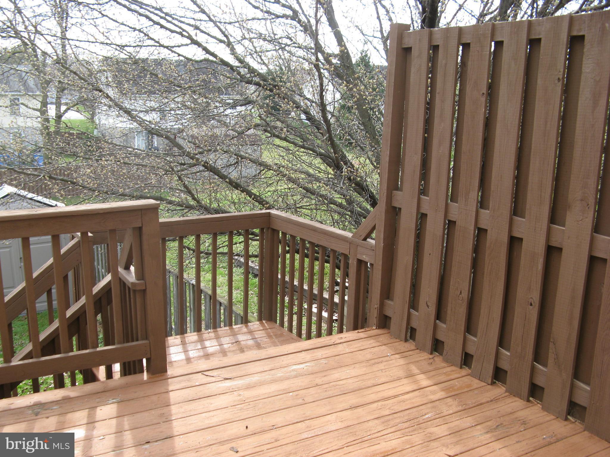 102 Chatham Square Winchester, VA 22601 - Photo 23 of 29 a view of wooden deck