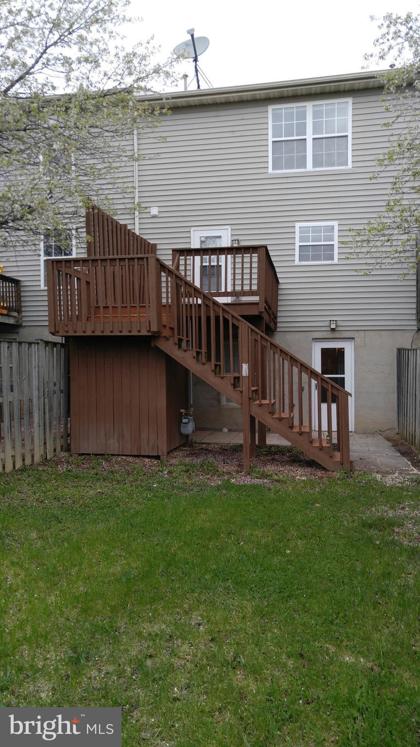 102 Chatham Square Winchester, VA 22601 - Photo 25 of 29 a view of a house with a backyard