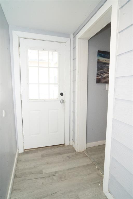 2136 Ridgeway Street Arlington, TX 76010 - Photo 18 of 32 a view of an empty room with cabinet and a window