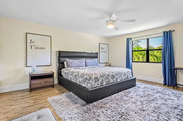 a view of an outdoor sitting area with furniture and garden