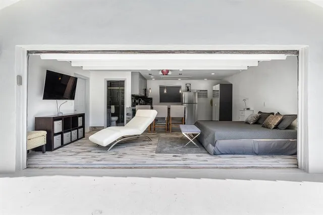 a swimming pool with outdoor seating