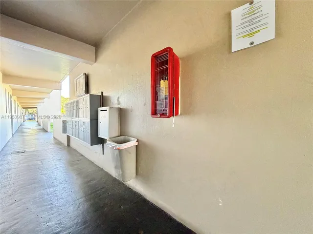 a view of a park with large trees