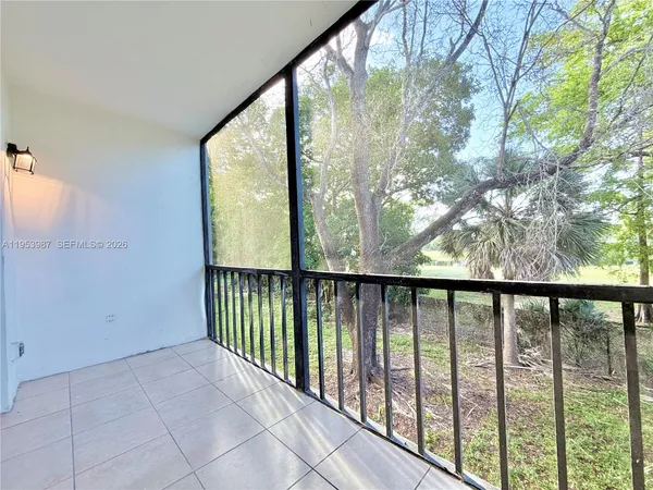 a view of a large window with an outdoor space